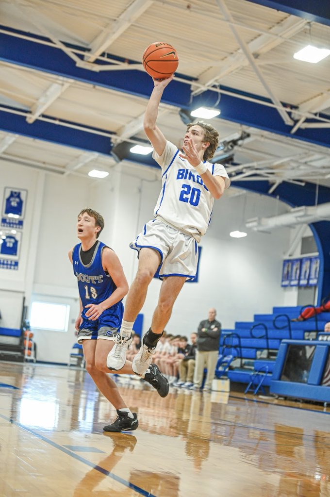 Peyton Zimmerman (10) shoots a floater. 